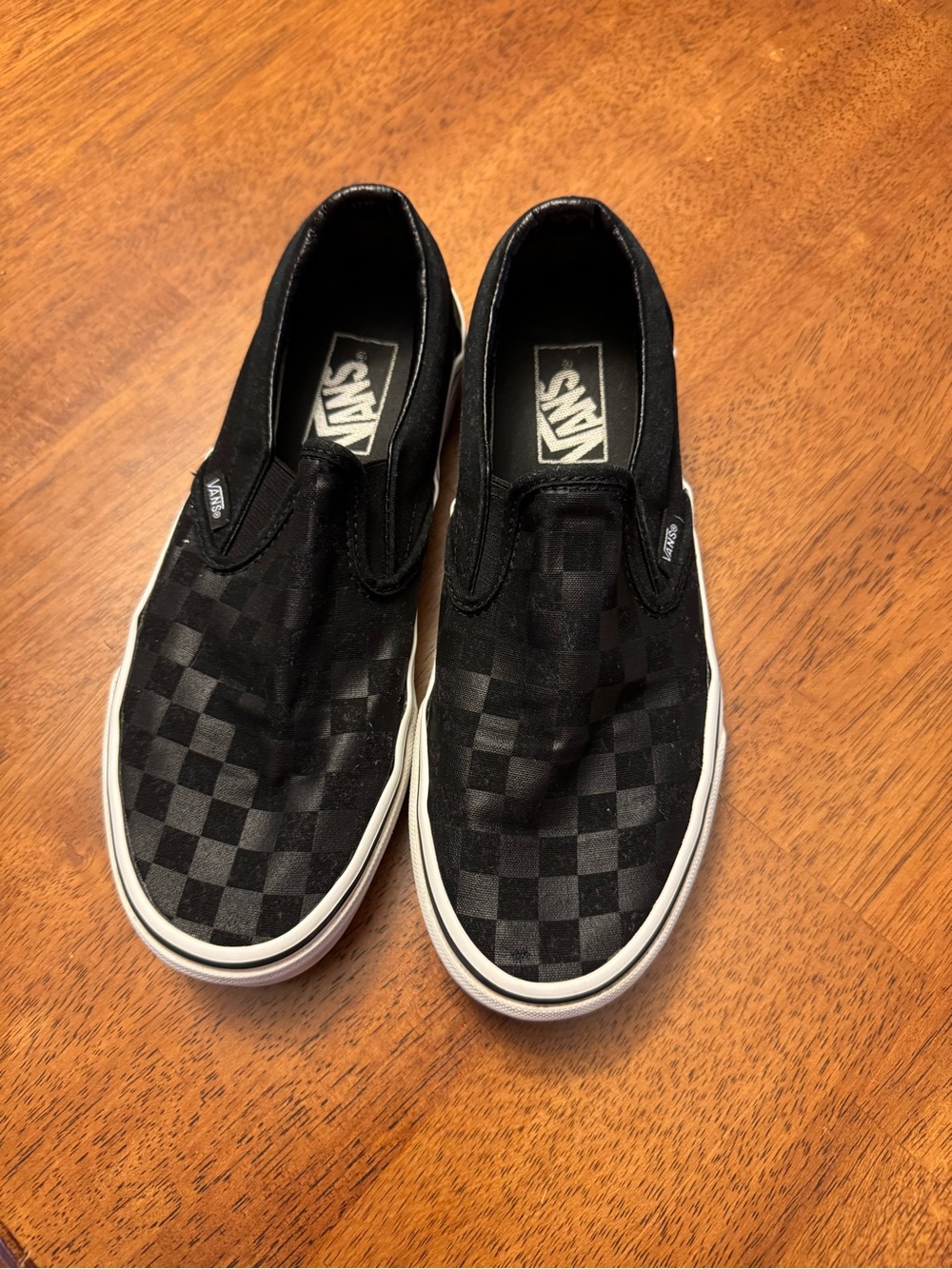 Vans Men’s/Women’s Black Checkerboard Slip-On Sneakers